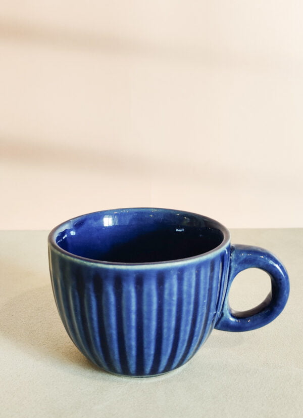 Blue ceramic tea cup