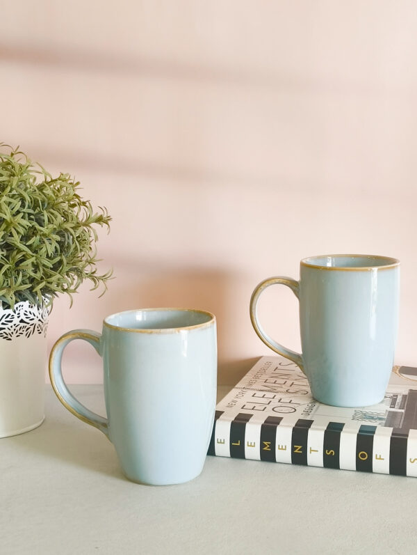 Handmade ceramic tall coffee mug in blue