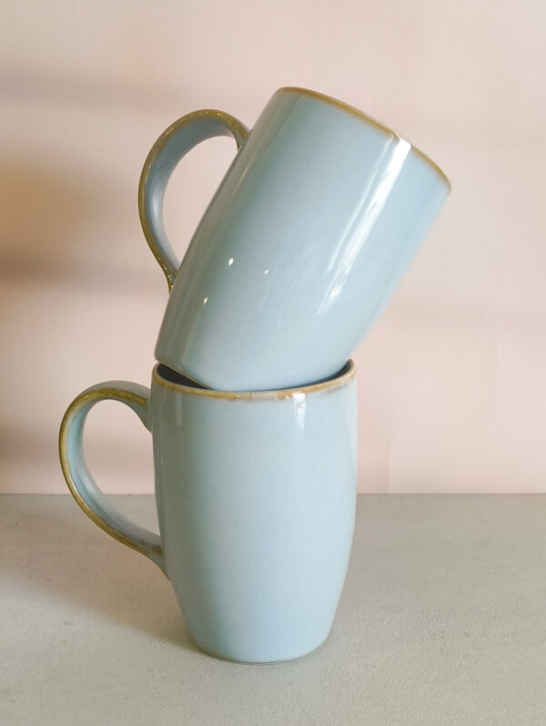 Handmade ceramic tall coffee mug in blue